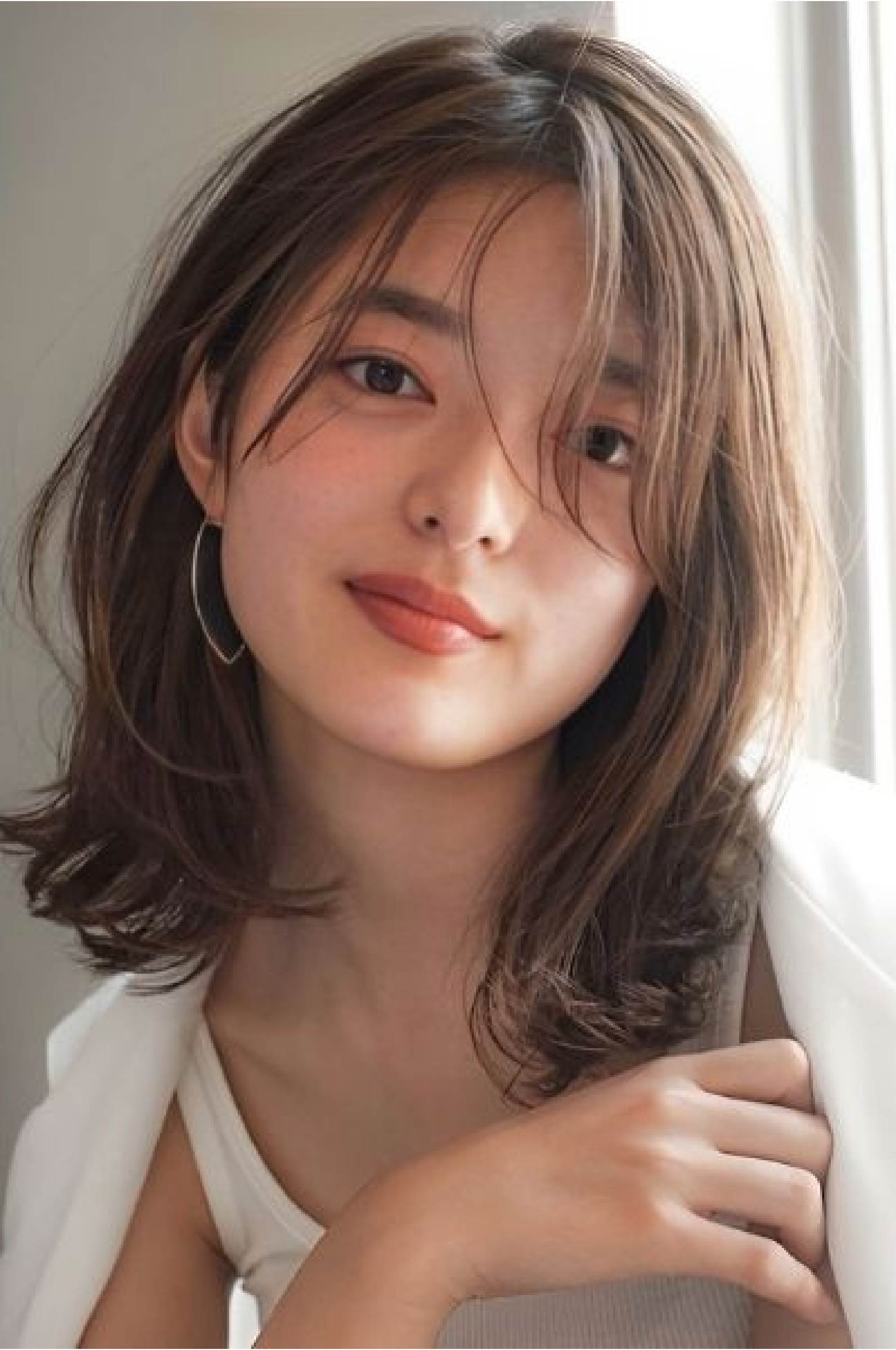 Tóc ngắn ngang vai mái bay